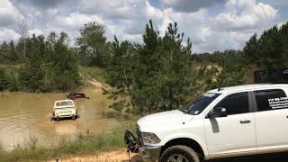 Get You Out Offroad Search and Recovery pulling a Dodge Ram Out a belly of water!