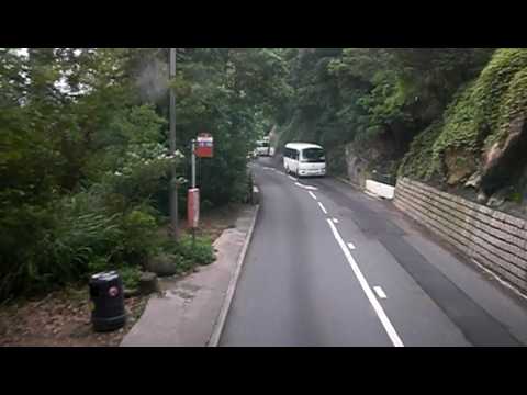 Skilled Hong Kong bus driver - descending Victoria...