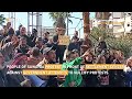 People in Syria's Suwayda protest before government settlement center