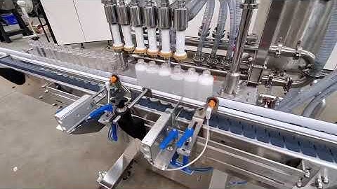 Galick Packaging - 6 Head Overflow Filler filling 250ml Round Bottles of Sanitizer