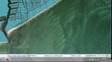 The bottom status bar in QGIS