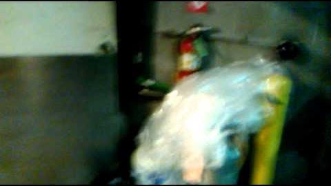 Trash can in front of fire ext loading dock