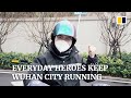 Everyday heroes remain on duty, keeping Wuhan city functioning
