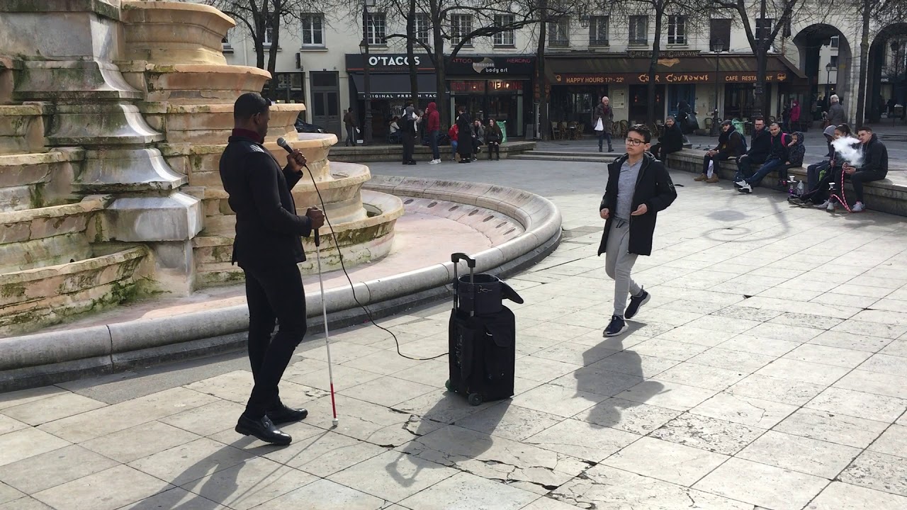 Redemption song Bob Marley street singer Paris France got talent