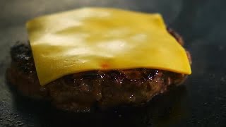 Cheeseburger On The Grill Stock Video