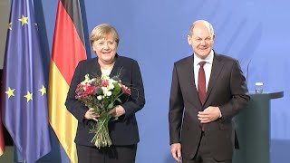 Merkel hands over to Scholz as German chancellor