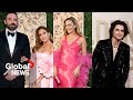 Golden Globes 2024: Celebrities mingle on the red carpet in glitz and glam