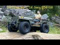 HG  Trasped 1/14 Jeep HG4-58 with new wheels and tires 