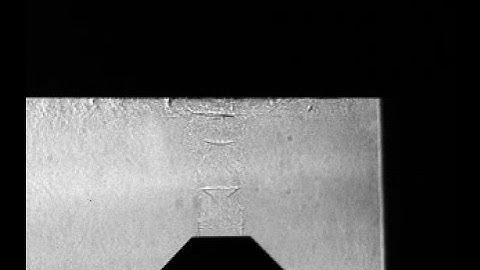 Axially Flapping Instability in Impinging Underexpanded Jets