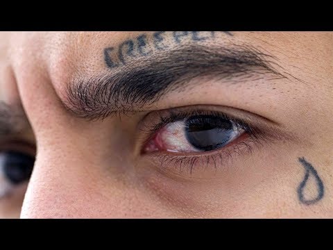Vídeo: O que significa uma tatuagem de lágrima não preenchida?