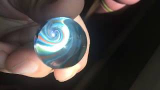 Celebrity hand blown glass purple vortex spiral marble with window lens Profile