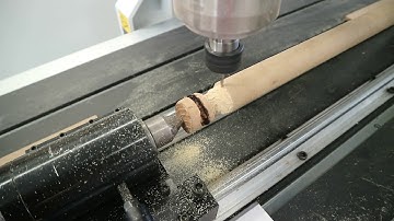 4 axis 6090 cnc router machine with rotary working on wood