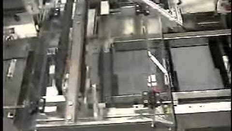 Econcorop E-System 2000 with Bucket Conveyor & Product Loader for tubes of toothpaste