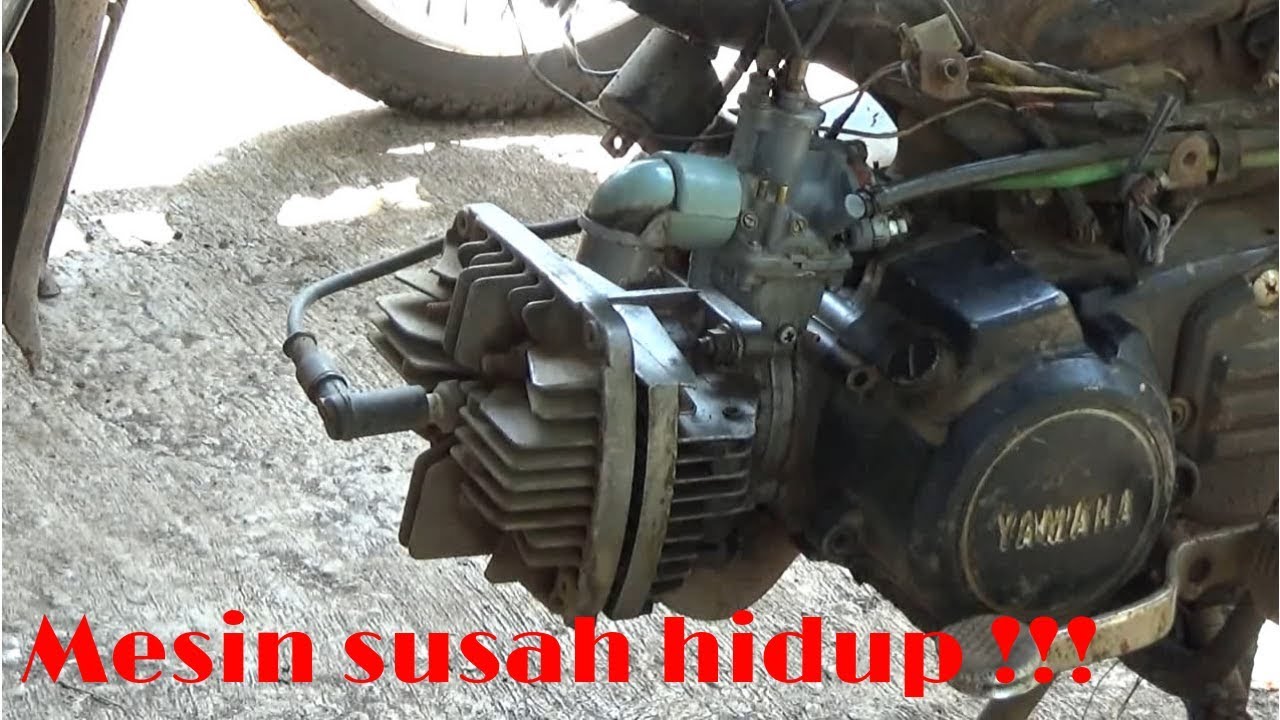 Memperbaiki atau servis motor susah hidup. 