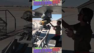 U.S. Airmen load ordnance onto F-16 Fighting Falcons