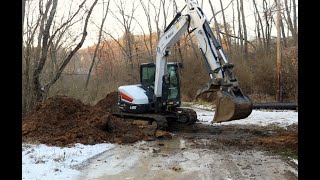 #644 Bobcat E85, Beast of a Compact Excavator, Replacing and adding culvert pipes on moms driveway.