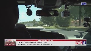 Law enforcement on training for serving warrants