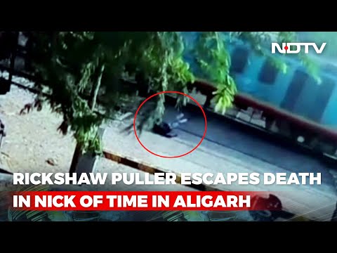 Video: Rickshaw Puller Narrowly Escapes Being Hit By A Speeding Train