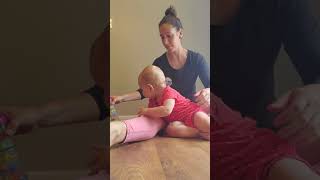 Transitional skills: In and out of quadruped over adult leg