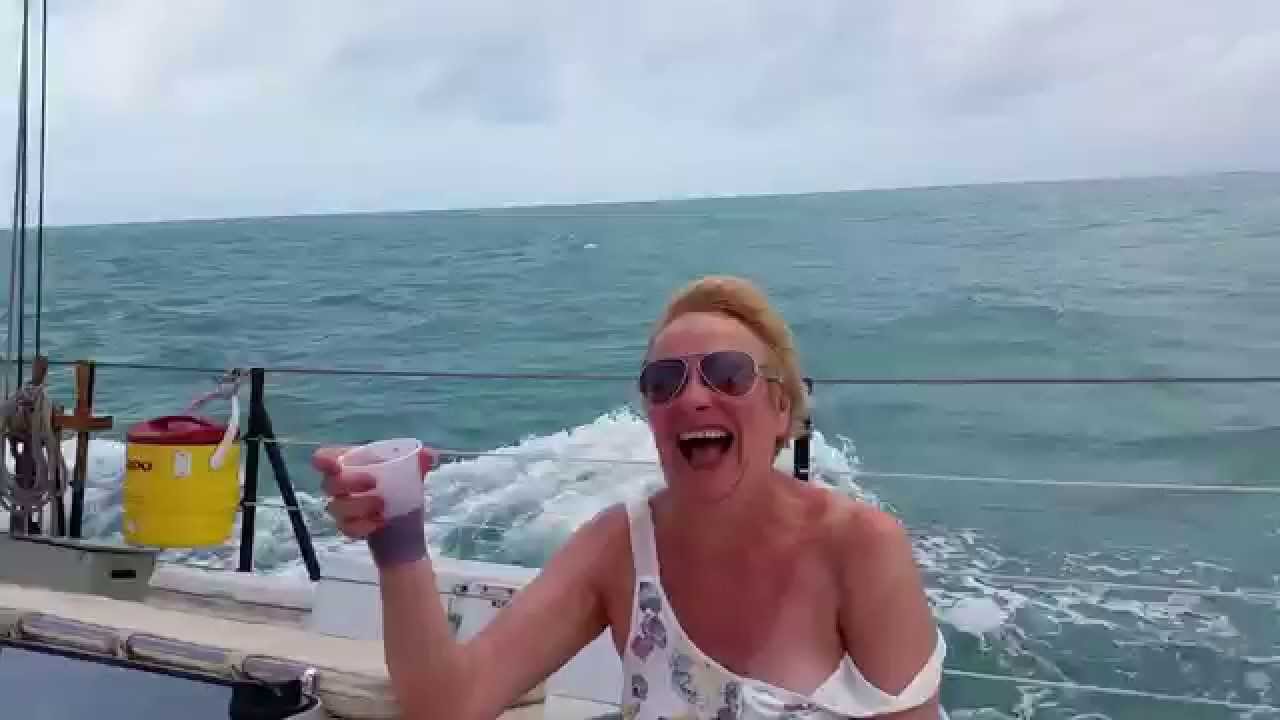 Wind blows off ladies t-shirt at Key West - almost - YouTube