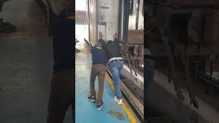 Mind the gap: Commuters push train to save trapped man in Perth