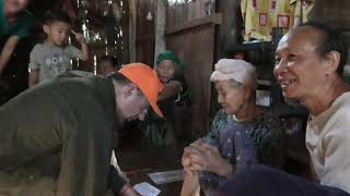 Free Burma rangers in Karen State, Burma. An old karen lady with cataract gets help screenshot 5