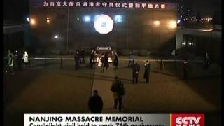Candlelight vigil held to mark 76th anniversary