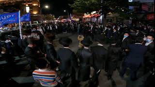Members of ultra-Orthodox community dance in Borough Park, October 7, 2020