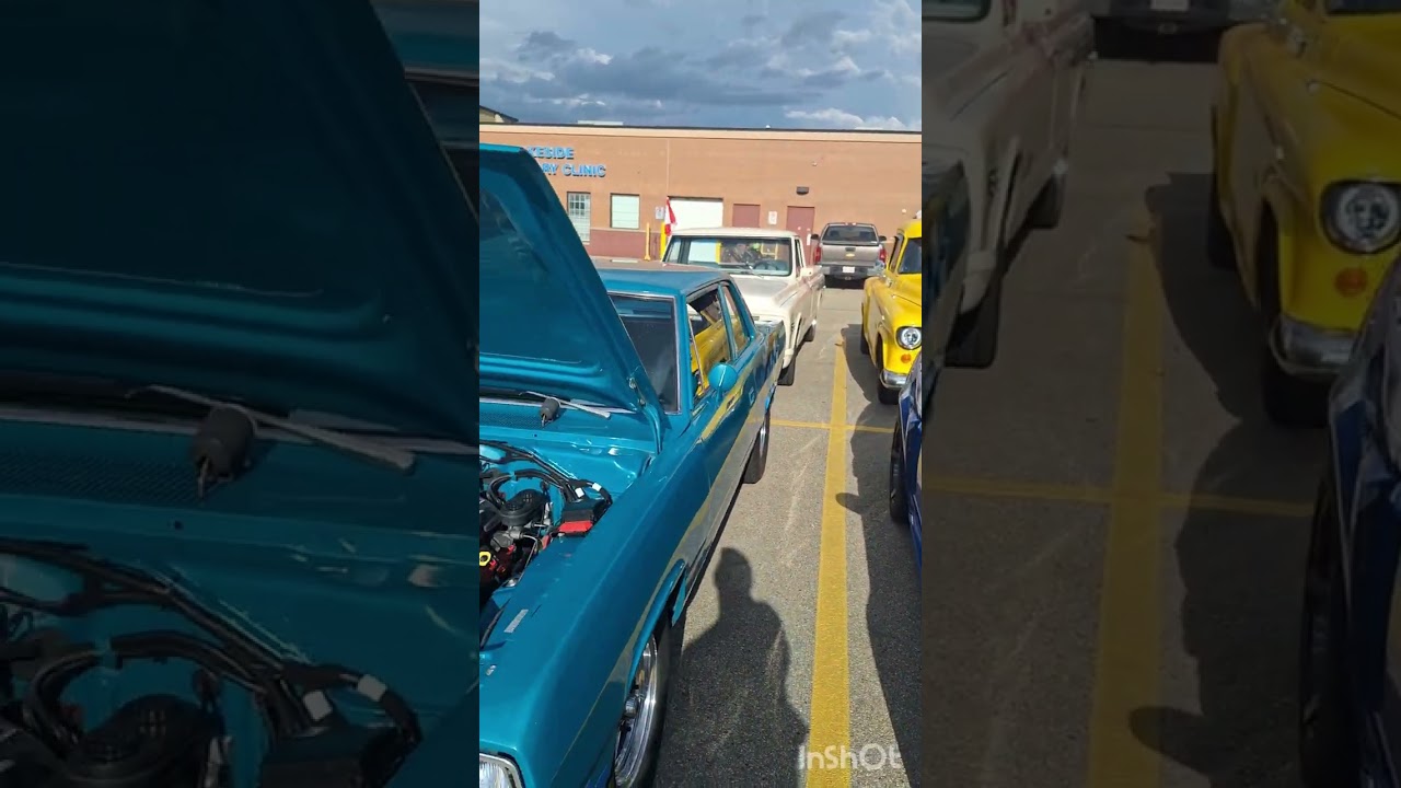 Not everyone was at this exhibition. Car show. Sherwood Park, Alberta, Canada.