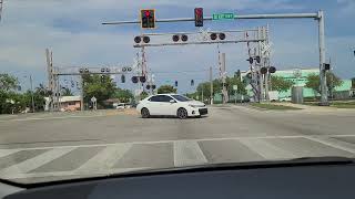 Sheridan St Hollywood Florida at Dixie Highway Police running red with lights on #badcop #hollywood