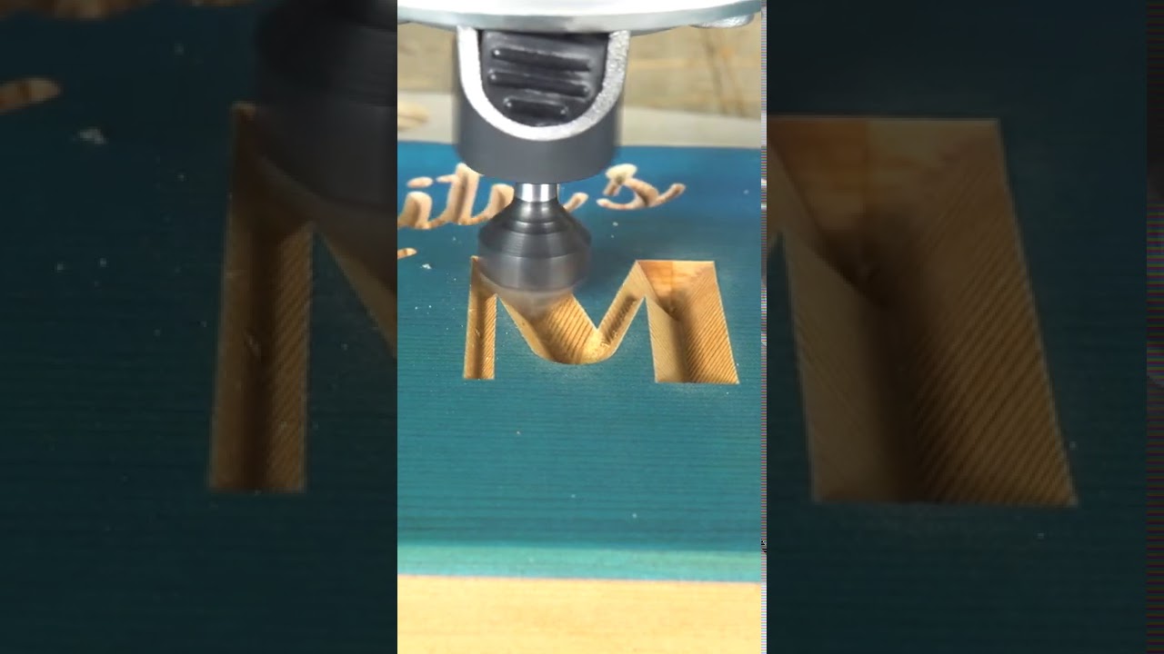 V-образная резьба по кедровому знаку