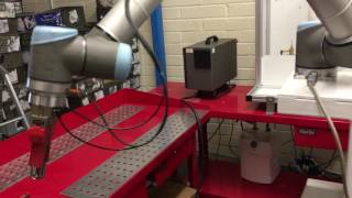 T-375 + light curtain & robotic arm