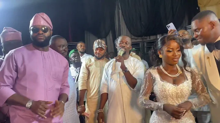 FEMI ADEBAYO AND ALAO MALAIKA ON STAGE AT LUYEK AND MOTUNRAYO’S WEDDING RECEPTION