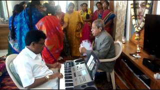 Prof.Anilkumar garu singing bhajan on 6th Dec.