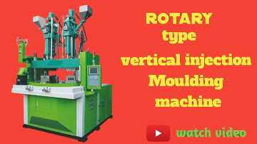 Rotary type vertical injection moulding machine.