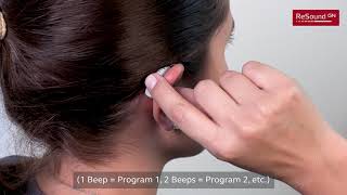 Change programs with the push button on your RIE hearing aid