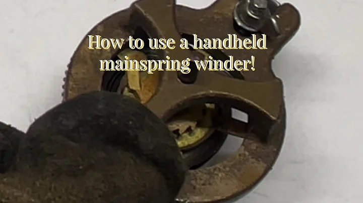 Using a hand held mainspring winder!