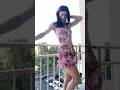 Crossdresser jezebel in a pink beach dress