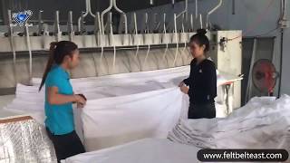 Flatwork ironer commercial laundry folding working