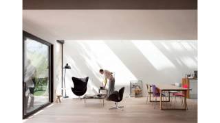 Minimalist eco sustainable house charms with a green sloped wooden pergola
