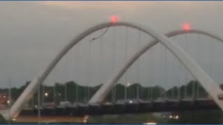 Activist remains perched atop DC bridge protesting Iran war, AI development