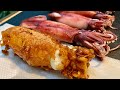 イカを丸ごと唐揚げにしてハイボールをキメるだけの動画