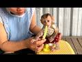 So delicious!! Smart baby LIORA sits on a small chair and tastes cucumbers with her mom