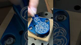 Anodized front caliper for a custom #harley #ironhead #handengraving #engraved #scroll #custombike