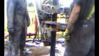 short clips of laying down pipe with a laydown machine