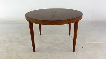 Johannes Andersen Style Mid Century Teak Expanding Dining Table with 4 Leaves