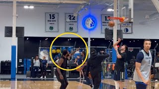 The Dallas Mavericks superstars rebound for each other during practice.