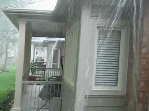 Heavy rain falls from our Gutter and Eavestrough System
