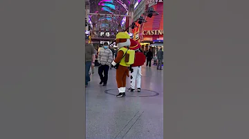 Las Vegas Strip street performer hustler hustles showgirls photo tips shakedown busker Fremont st