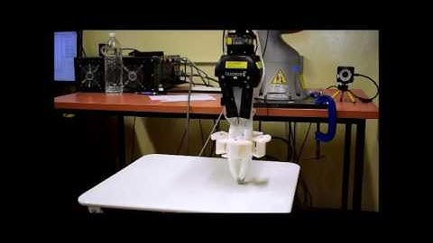 3D-Printed Soft Robotic Hand (with Fingernails) attached to arm: Lifting a coin